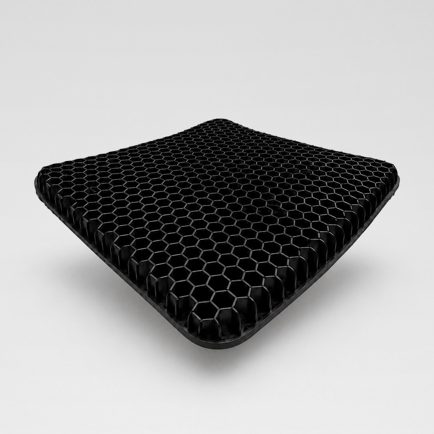 CloudGel cooling honeycomb gel seat cushion in black, shown at an angle on a light gray studio background.