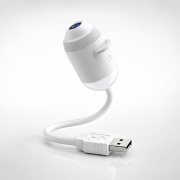 AstroDrift USB star projector with flexible gooseneck and USB plug for car and home