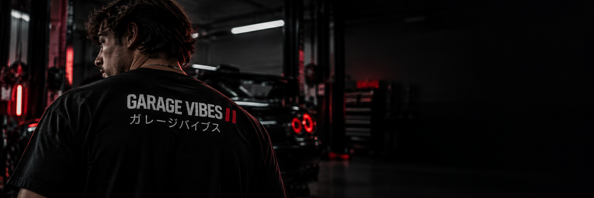Garage Vibes shirt worn inside a workshop